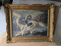 Front view of framed print showing artwork and ornate frame