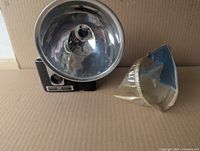 Camera front with flash reflector and plastic cover