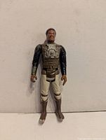 Front view of Lando Calrissian figure showing paint, joints, attire