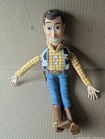 Front view of Woody figure showing overall condition