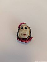 Front view showing Miss Piggy face and painted details
