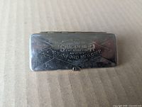 Front view showing stamped logo and overall condition
