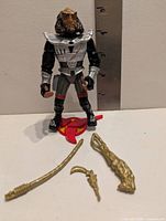 Front view of Gowron figure with accessories laid out