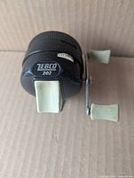Front and side view of Zebco Zee Bee 202 spincast reel showing overall condition and design