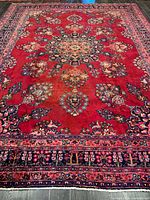 Full view of Mashhad rug showing central medallion and border