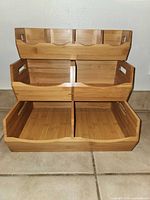 Assembled view of bamboo organizer showing stacked configuration and compartment layout
