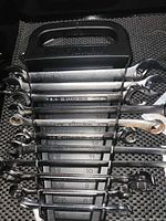 SAE wrench set on holder rack