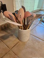 Holder with all utensils grouped