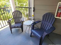 Overall view showing both chairs and table on patio