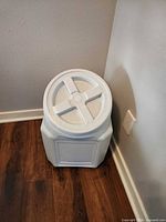 entire container front view showing lid and body