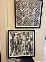 Both framed prints displayed together