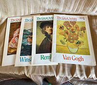 Front view of four The Great Artists softcover books: Van Gogh, Renoir, Rembrandt, Winslow Homer