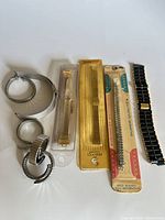 Overview of all seven watch bands showing types and packaging