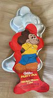 Front of Wilton Mickey Mouse Party Pan with original insert