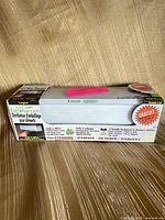 Sealed box containing EzeeWrap 1000 dispenser