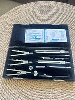 complete drafting set open showing all tools and instruction sheet