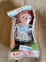 Raggedy Ann doll inside original clear plastic box