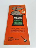 Front cover of recipe booklet showing title graphic and overall wear