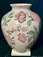 Front view showing floral decoration and crackle glaze