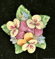Front view showing multicolor porcelain flowers