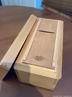 full view wooden plane with lid removed