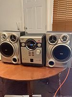 Front view of complete RCA stereo system showing main unit and two speakers