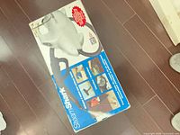 Retail box top showing SteamShark branding and product images