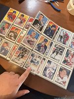 Pages of Upper Deck hockey cards in plastic sleeves