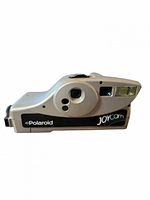 Front view of Polaroid JoyCam showing lens, flash, logos