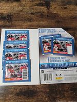Front view of sealed packs and blister card