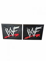 Front view of both WWF Attitude logo stands