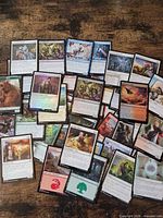 Spread of assorted MTG cards showing variety of colors and artwork