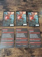 Six cards laid out showing fronts and backs