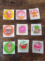 Front view of all nine stickers on backing sheets