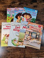 All six books spread out showing covers