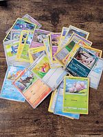 Assorted Pokémon cards fanned out showing fronts
