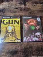 Front view of both PS2 game cases