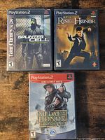 Front view of all three PS2 game cases
