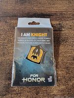 Front view of sealed Ubisoft For Honor I Am Knight pin on backing card