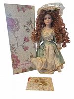 Doll standing with box and certificate visible