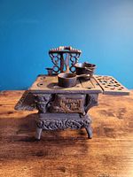 Full view of Crescent mini stove with attached accessories