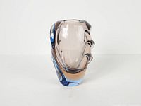 Front view of sculptural Sommerso vase showing blue and amber layers