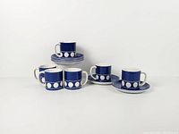 Group shot of all cups and saucers