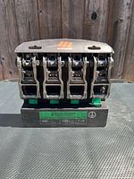 Front view of packaged Motomaster 4-pack ratchet straps