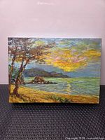 Front view of oil painting showing seascape scene