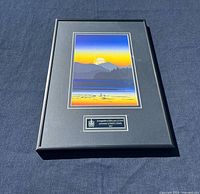 Full view of framed print showing artwork and plaque