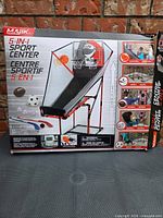 Front of retail box showing Majik 5-in-1 Sport Center image and features