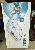 Retail box front showing product image and branding