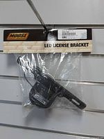 Front of sealed package showing Moose header card and bracket