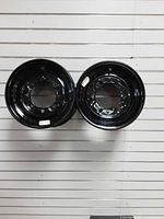 Both black steel wheels front view